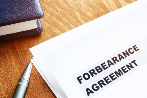 Forbearance,Agreement,Papers,With,Pen,And,Notepad. - Forbearance Agreements Explained Foreclosure Defense Attorneys
